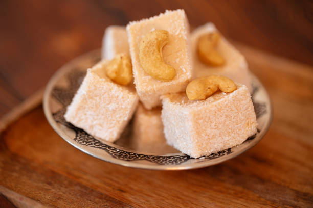 istock Turkish sweets on small plate on brown wooden background 1346340446