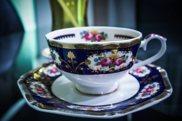 istock Coffee cup on glass table in the meeting room, Background 1346348627