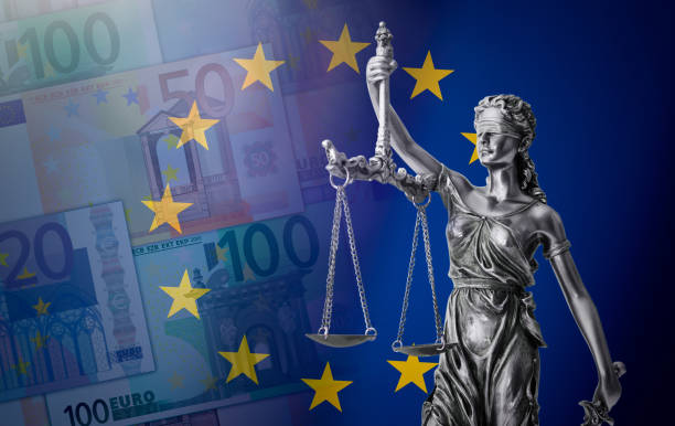 Law and justice, EU flag and Euro currency concept stock photo