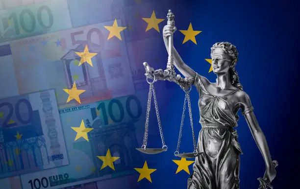Law concept with lady justice. Composition with European Union flag and Euro banknotes in the background