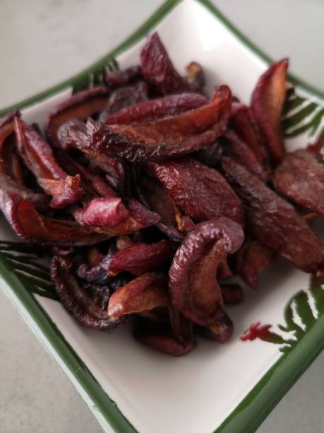 istock Sun-dried Plums, Prunes in a Bowl 1346352483