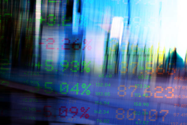istock Blurred Financial Buildings with Trading Data. 1346352815