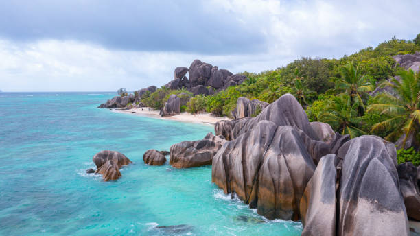istock The Anse Source d'Argent with the massive granite rocks and turquoise blue water on La Digue Island in the Seychelles 1346353549