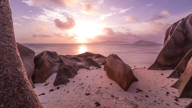 istock Sunset at the beach Anse Source d'Argent on La Digue in the Seychelles 1346353557