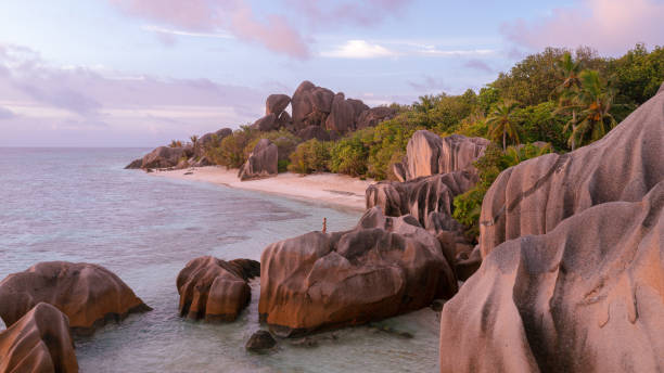 istock Tropical sunset at Anse Source d'Argent on La Digue in the Seychelles 1346353701