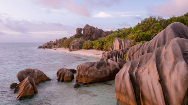 istock Red granite rocks during sunset at Anse Source d'Argent on the tropical La Digue Island in the Seychelles 1346353707
