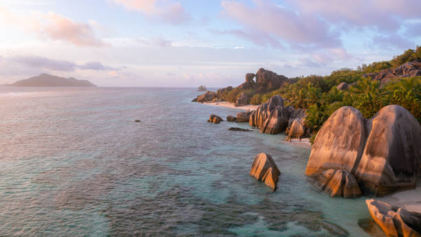 istock Nice sunset at Anse Source d'Argent on the tropical La Digue Island in the Seychelles 1346353711