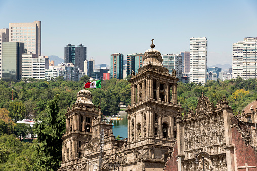 Mexico City panoramas and skyscrapers with Mexico City Cathedral, blue sky background