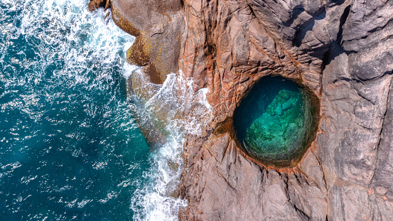 Aerial view of the natural Rock Pool at Takamaka Beach on Mahé in the Seychelles