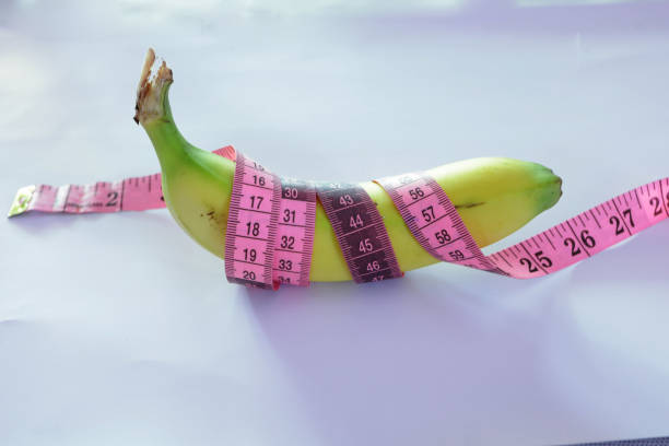 istock Banana and measuring tape 1346357345