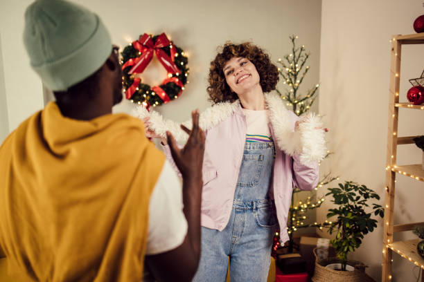 istock Young couple having fun dancing for the New Year party 1346360976