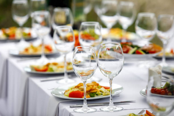 istock Empty glass before the start of the banquet. 1346363090