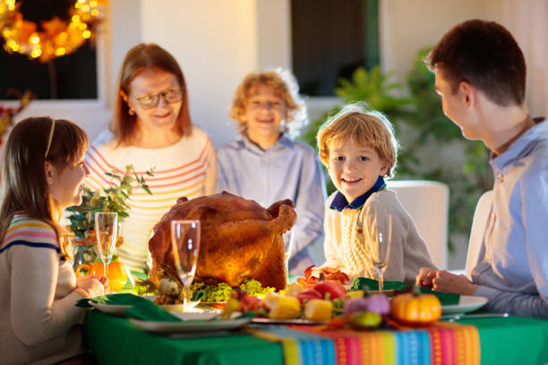 istock Thanksgiving family dinner. Roasted turkey meal. 1346366715