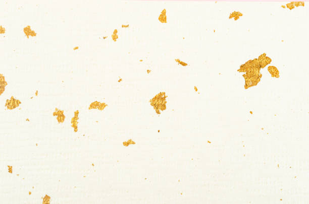 金色のシートテクスチャを持つ紙 - gilded ストックフォトと画像