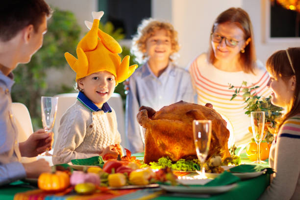 istock Thanksgiving family dinner. Roasted turkey meal. 1346366786