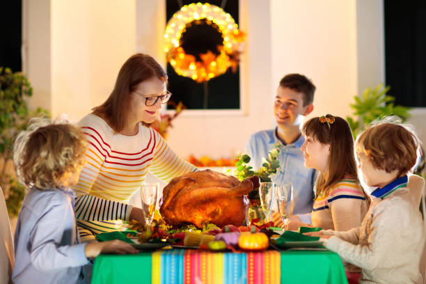 istock Thanksgiving family dinner. Roasted turkey meal. 1346366822