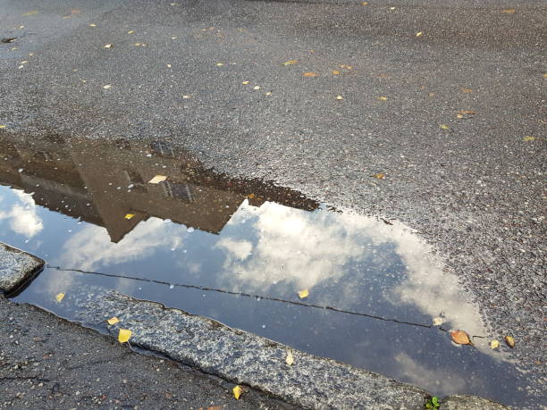 istock roads in autumn after rain 1346367437