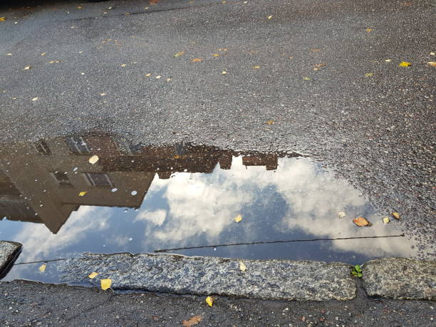 istock roads in autumn after rain 1346367490