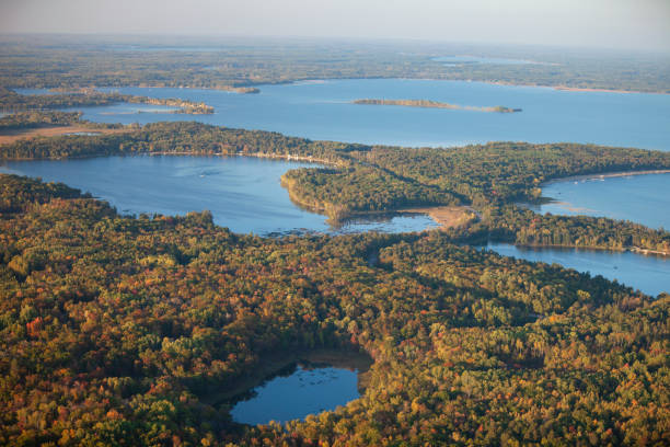 Aerial view of lakes and trees in autumn color near Brainerd Minnesota stock photo
