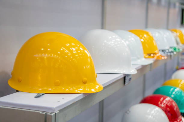 istock The group of plastic helmet on the shelf. 1346371398