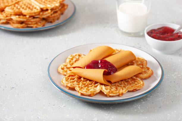 istock waffles with Norwegian brunost traditional brown cheese and raspberry jam 1346371410