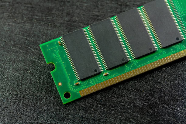 istock Random Access Memory or RAM for personal computer green color on dark wooden background. 1346372317