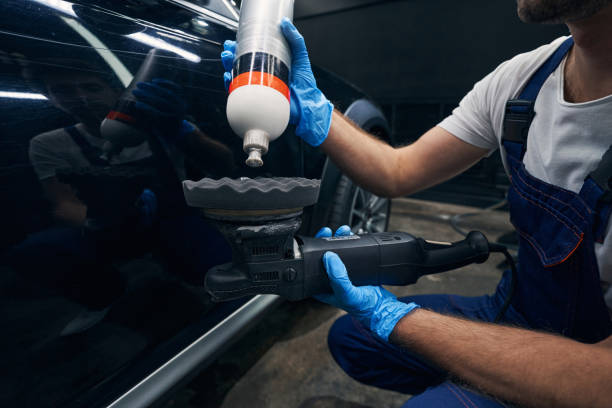 istock Male squeezing cream polish on polisher felt pad 1346375692