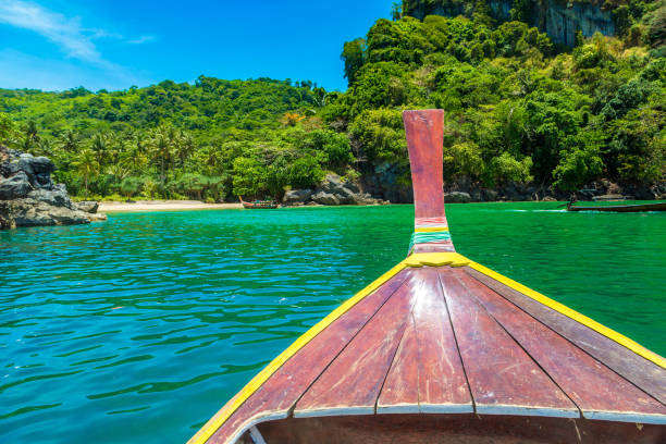 istock Thai wooden longtail boat 1346375824