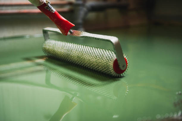 istock Epoxy flooring tools, preparation and application of epoxy resin green 1346376698