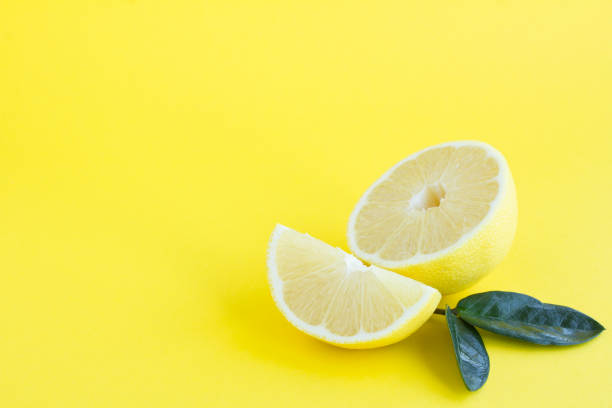istock Chopped lemon on the yellow background. Close-up. Copy space. 1346379079