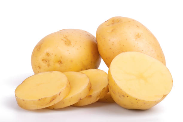 istock Group of whole and sliced raw potatoes isolated on white background close up 1346380607
