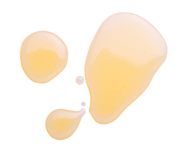 istock Puddle of olive oil isolated on white background 1346380674