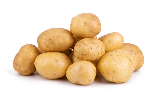 istock Group of potatoes isolated on white background close up 1346380729