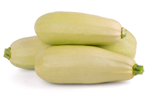 istock vegetable green zucchini isolated on white background close up 1346380740