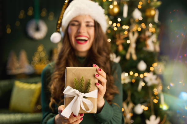 istock Closeup on happy elegant female in modern house 1346381005