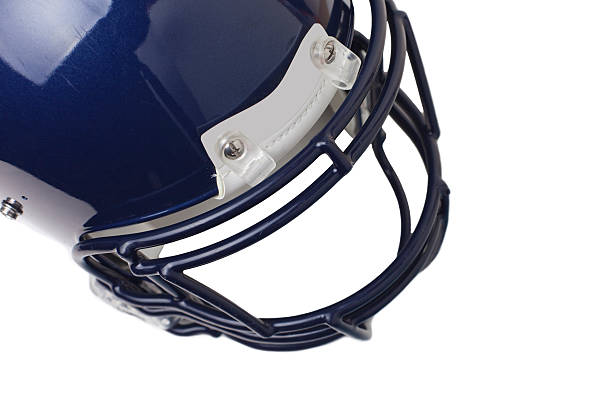 A blue football helmet on a gray background.