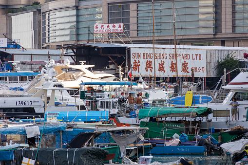 Hong Kong - October 11, 2021 : Shipyard in Aberdeen Harbour, Hong Kong. Aberdeen Harbour is the harbour between Aberdeen and Ap Lei Chau.