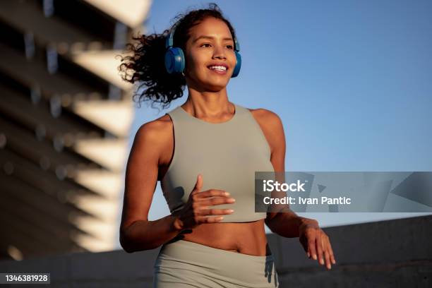 Young Latina Sportswoman Leading An Active Lifestyle Outdoors Stock Photo - Download Image Now