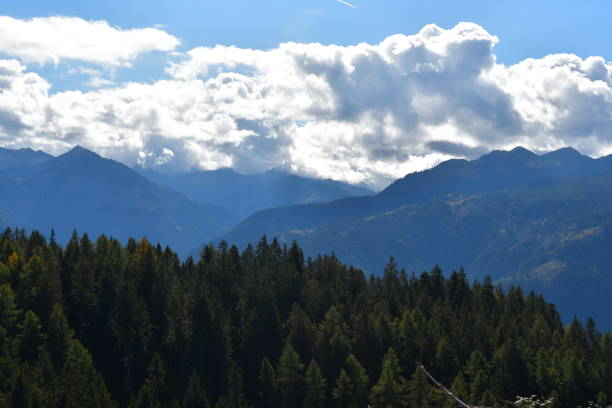 istock Beautiful landscape in Southtyrol with clouds 1346390560
