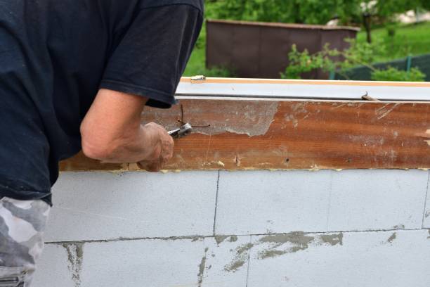 istock The bricklayer is preparing to concreting the walls on the construction site 1346390708