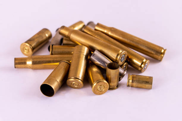 Pile of assorted spent bullet casings stock photo
