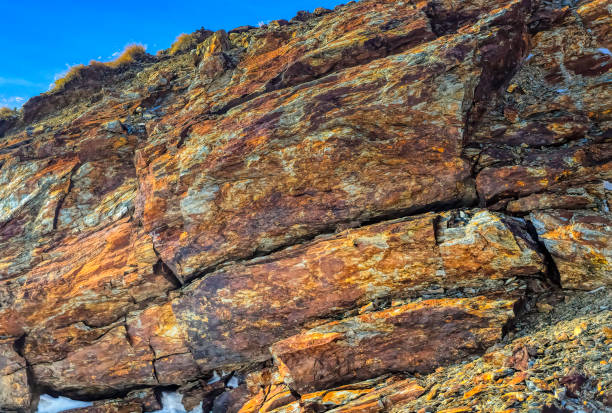 Nature stone texture in Dolomites mountains during winter time.