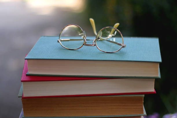 istock Vintage Books and Reading Glasses 1346394686