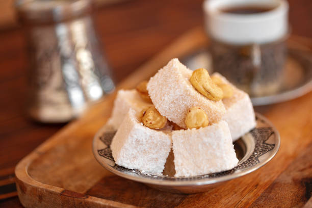 istock Turkish sweets on small plate on brown wooden background 1346394776