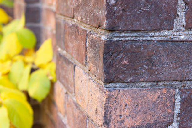 corner of an old stone wall. - corner stone wall brick imagens e fotografias de stock