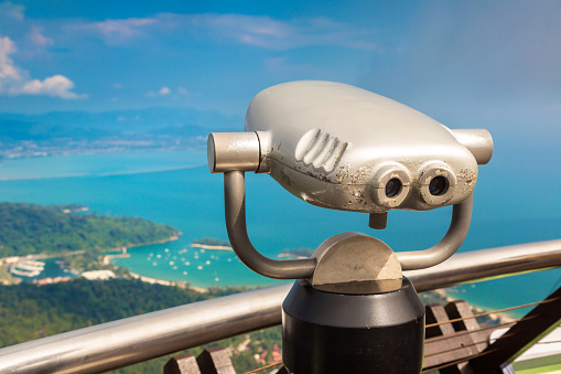 Binoculars at viewpoint with Panoramic aerial view of Langkawi island, Malaysia