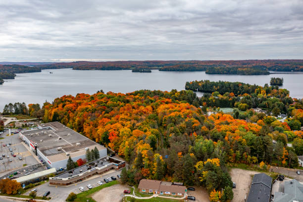 Huntsville Townscape and Fairy Lake at Fall, Ontario, Canada Aerial Huntsville Townscape at Fall, Ontario, Canada. huntsville ontario stock pictures, royalty-free photos & images