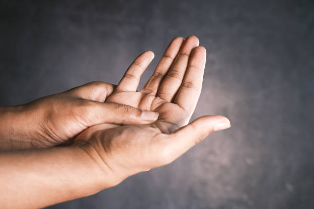 istock man suffering pain in hand close up 1346401498