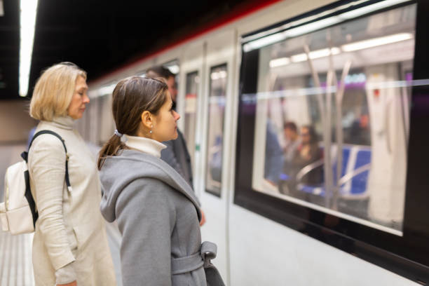 istock Passengers enter subway cars 1346401894