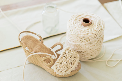 The shoes woven by hand in macrame technique are photographed